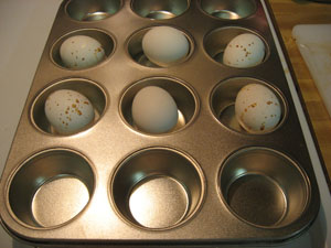 Place eggs in muffin pan