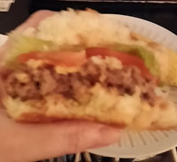 Half-eaten hamburger bun