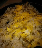 Stir eggs into rice rice